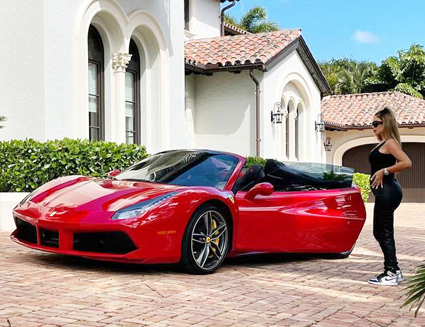 larsa pippen at the wheel of new ferrari