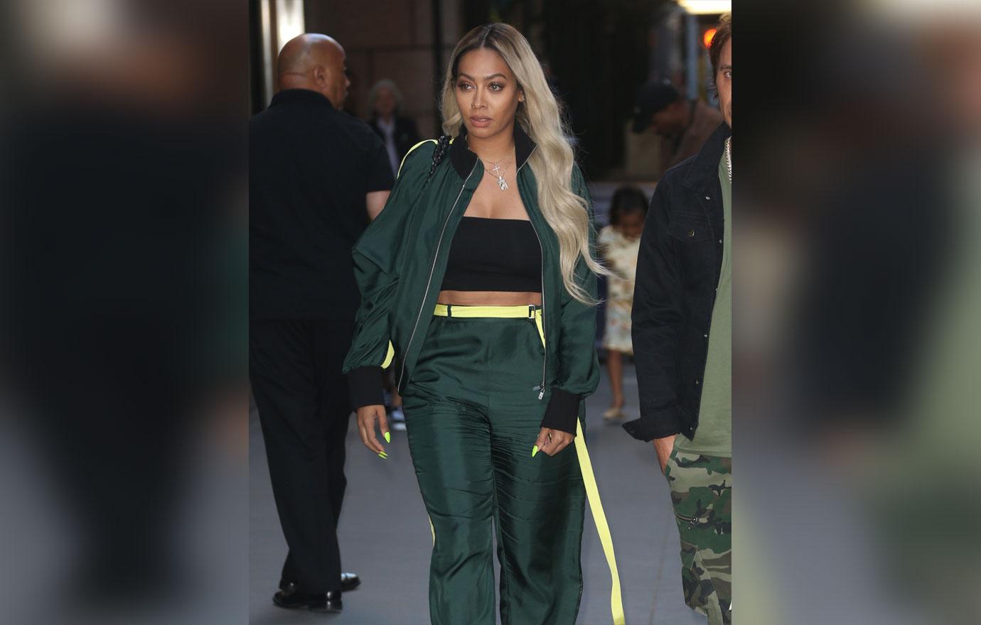 La La Anthony in green set