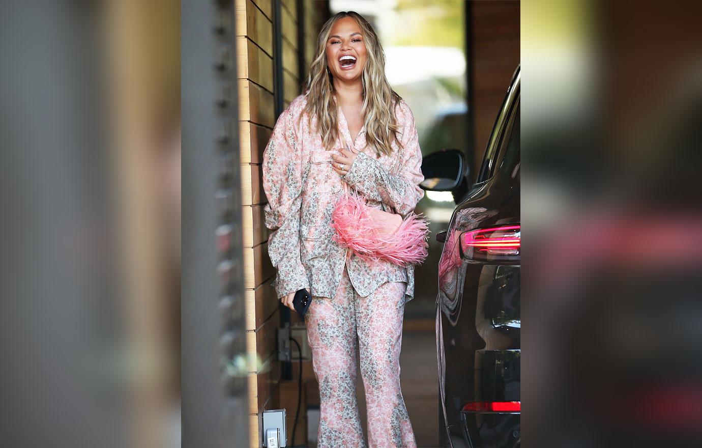 chrissy teigen laughing