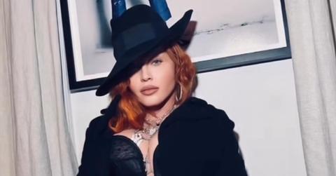 madonna ditches pants fishnet stockings miami art basel exhibit