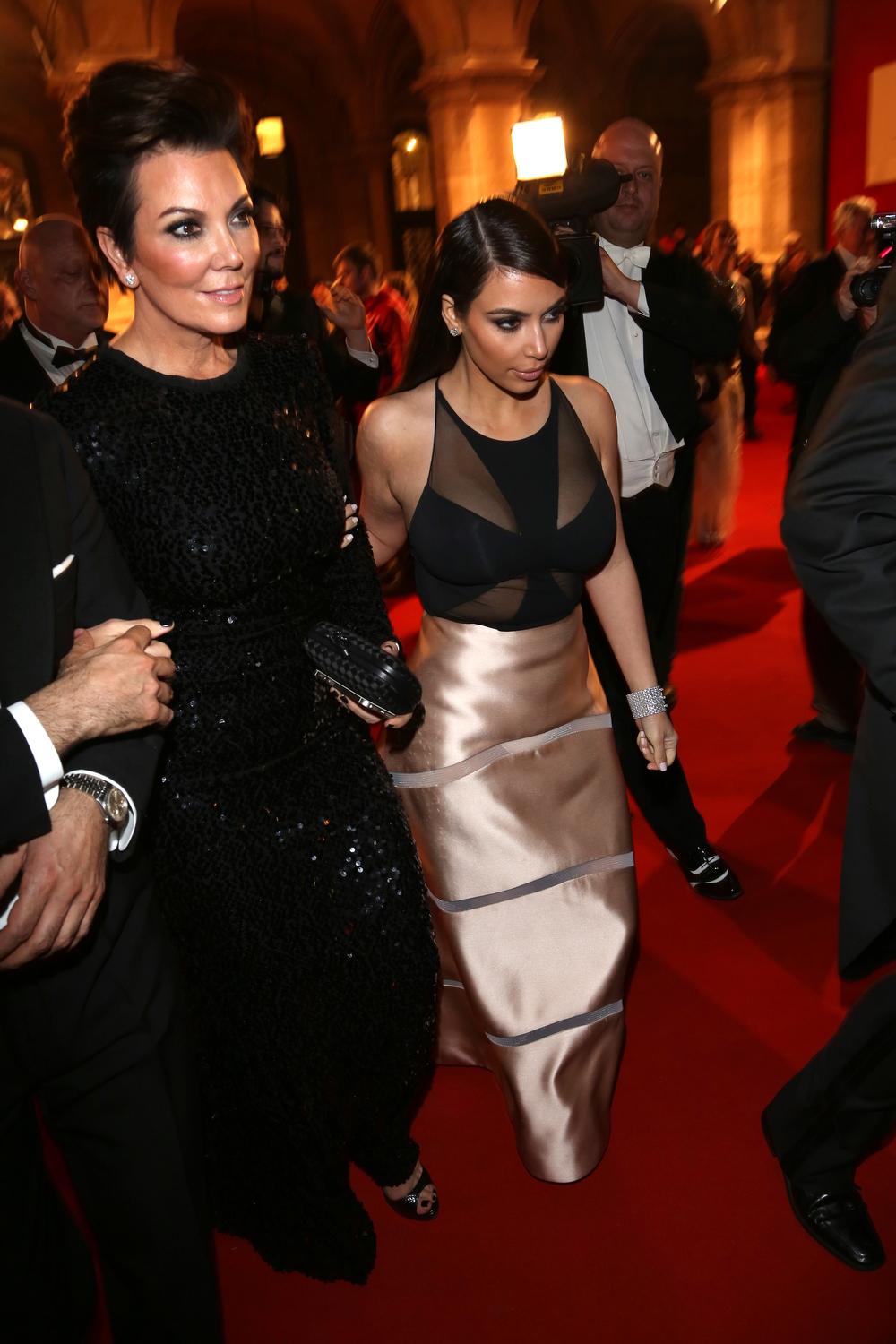 Kim Kardashian leaves the Operaball at the Viennese State Opera House in Vienna, Austria with her mother, Kris Jenner