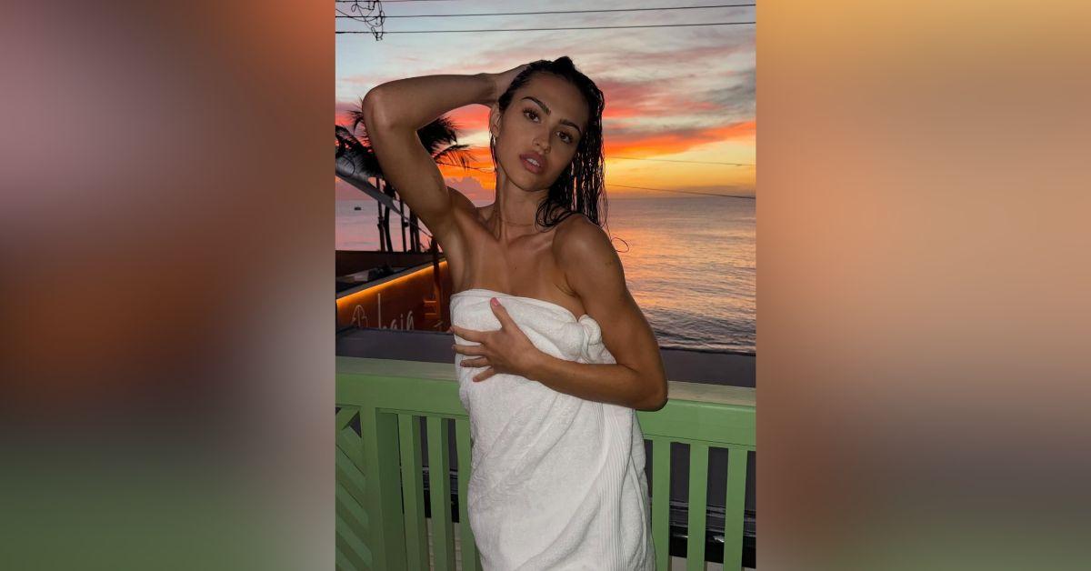 Image of Amelia Gray Hamlin only used a towel to cover herself up.