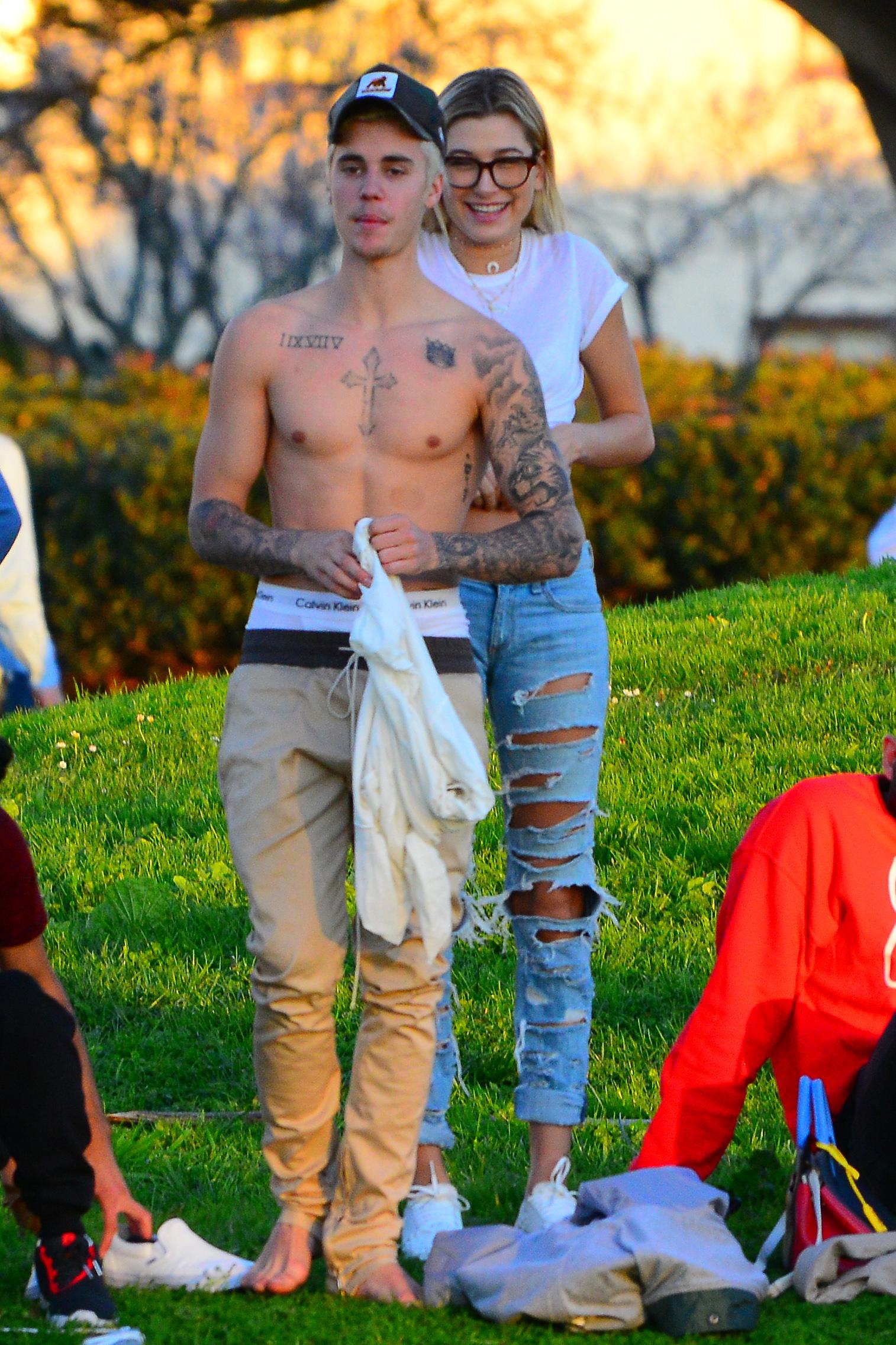 EXCLUSIVE: Justin Bieber and Hailey Baldwin drink and spotted in San Francisco park with friends