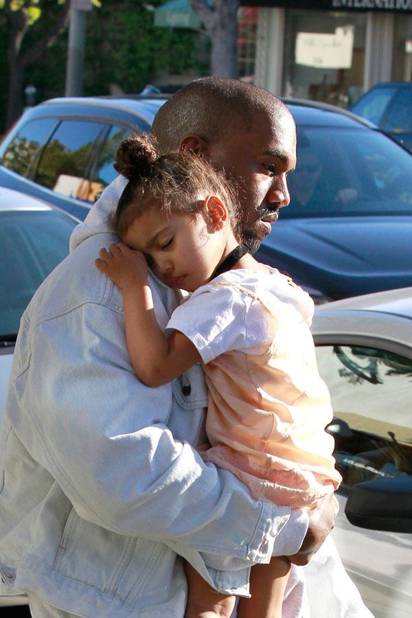 North West Caught Sleeping! Kanye West Carries His Daughter After A ...