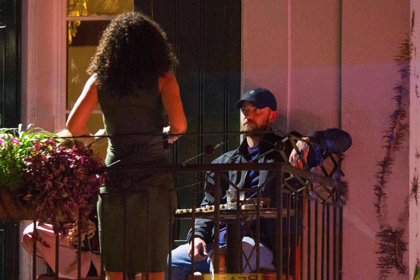 Justin Timberlake And Alisha Wainwright On A Balcony Jessica Biel