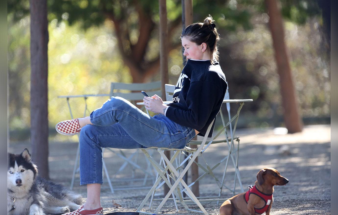 EXCLUSIVE: Ireland Baldwin takes her dogs for a walk in LA.