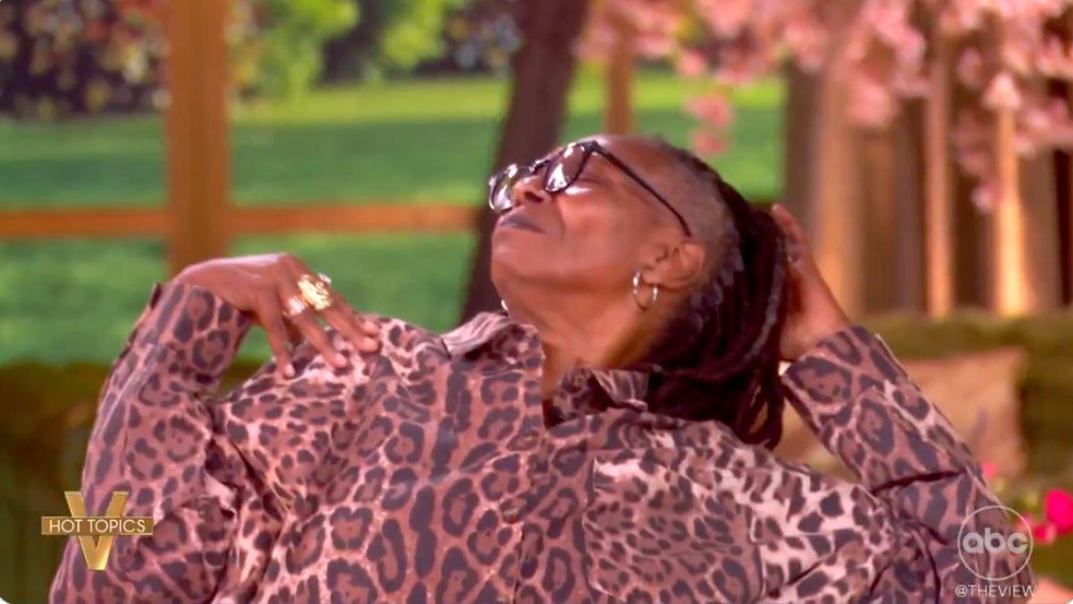 Photo of The movie star fell back in her chair as she pretended to relax in a lounge chair.