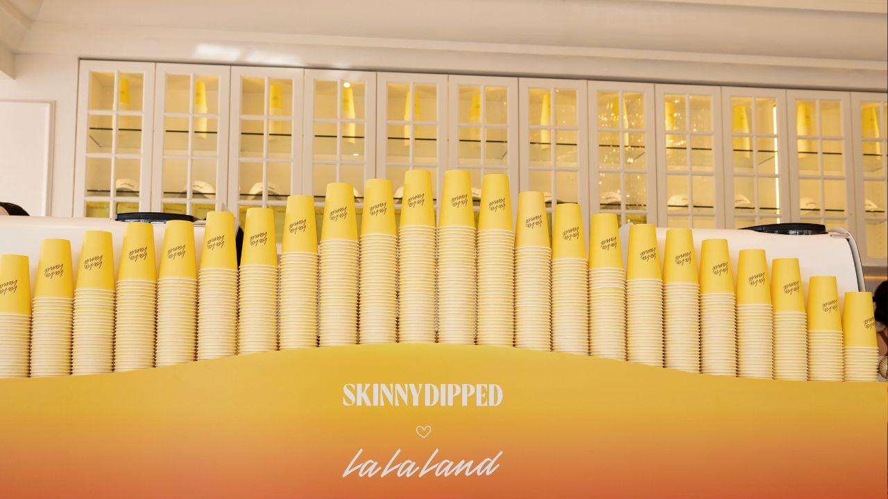 stassie karanikolaou keeps it effortlessly cool at skinnydippeds la la land pop up