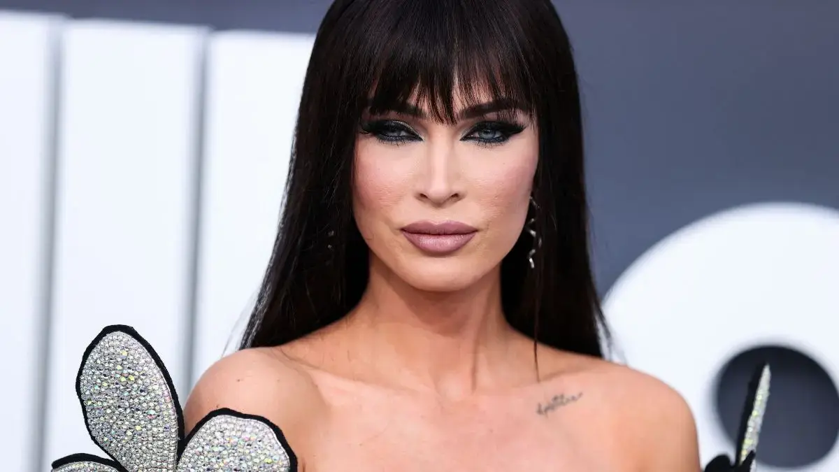 Image of The actress showed off her curves in sheer, lace-trimmed dress.