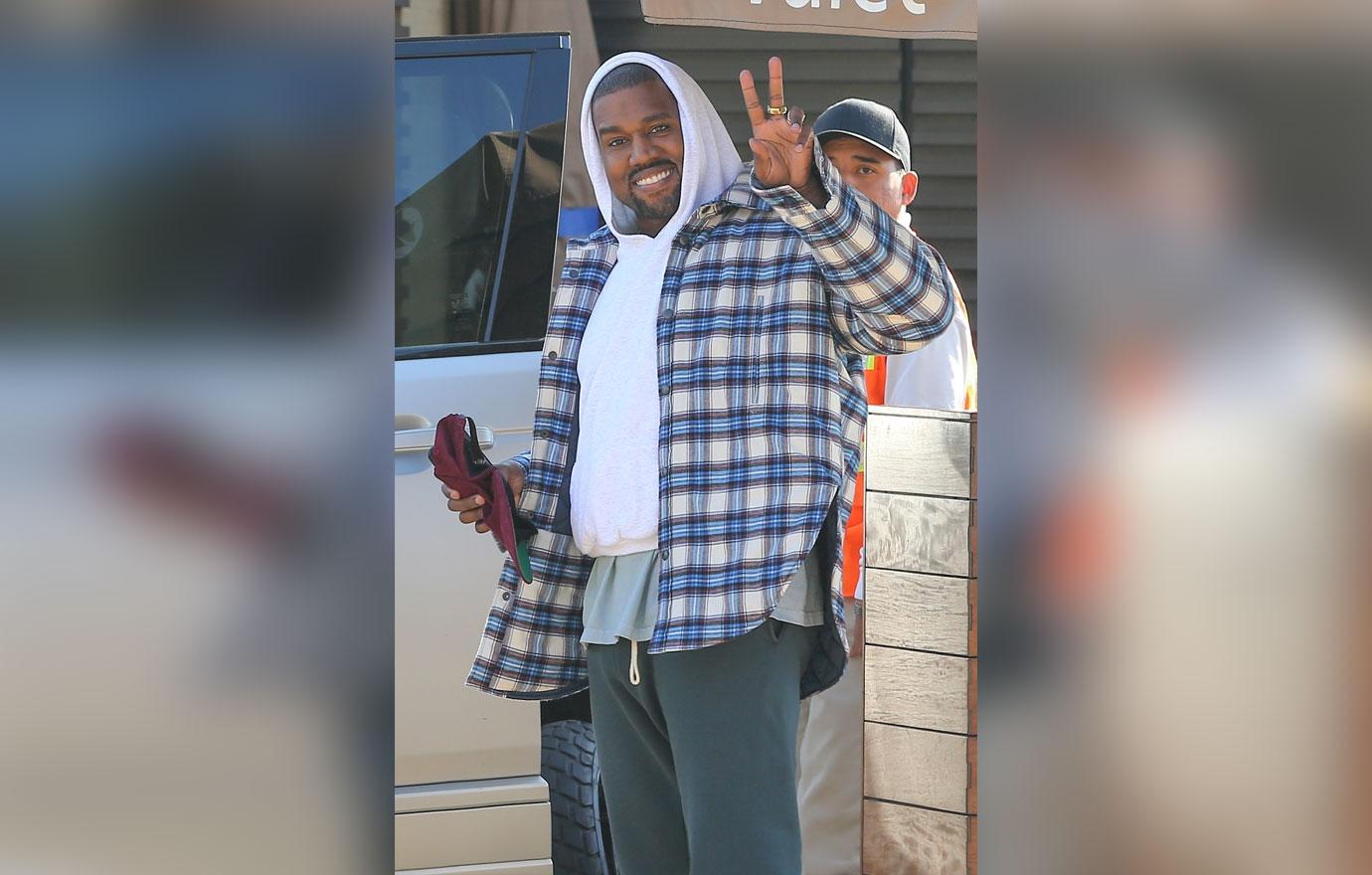 Kanye West Smiles Nobu