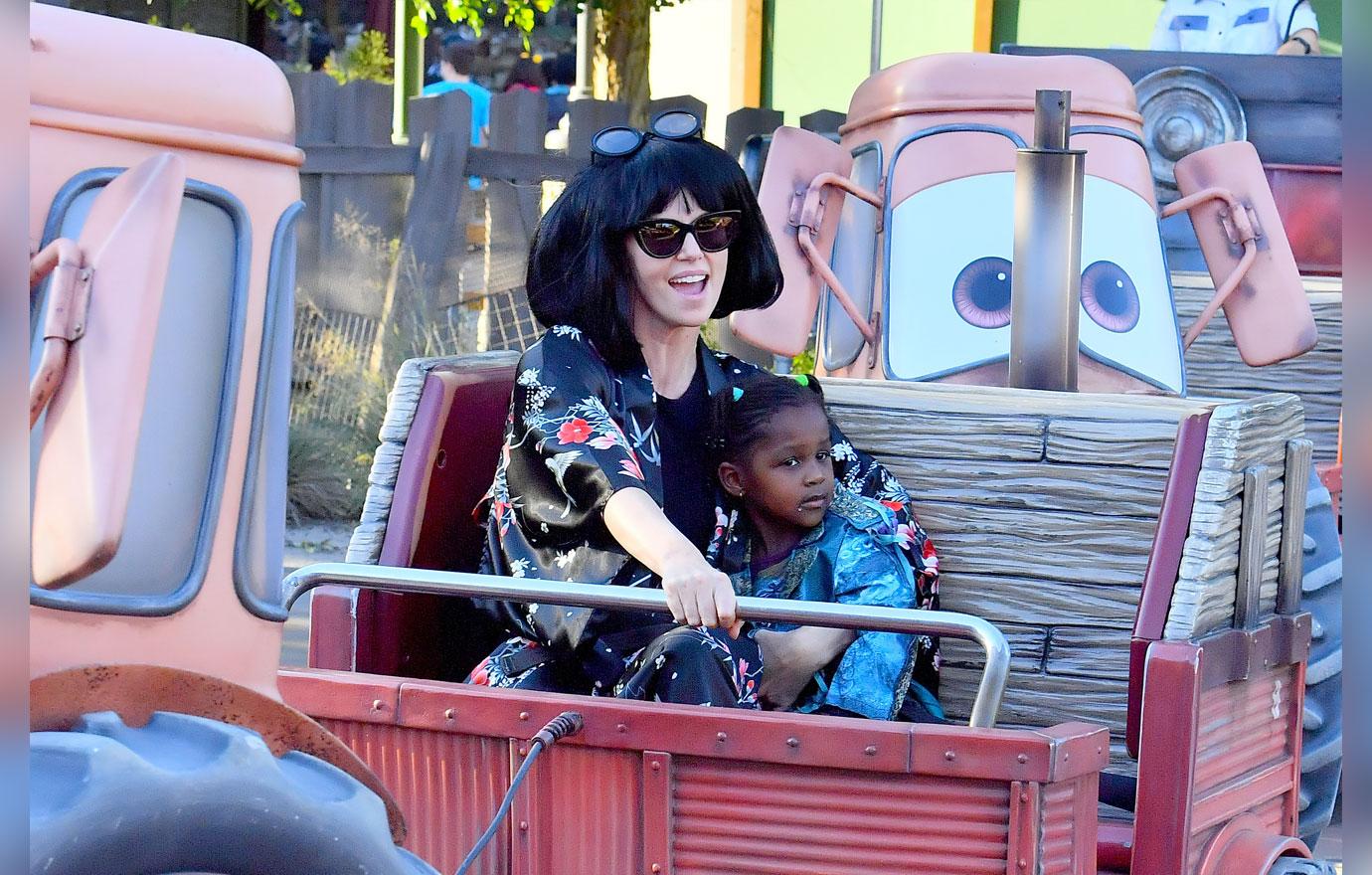 EXCLUSIVE: Charlize Theron dresses up as Edna from the Incredibles movie while out at Disneyland with her family