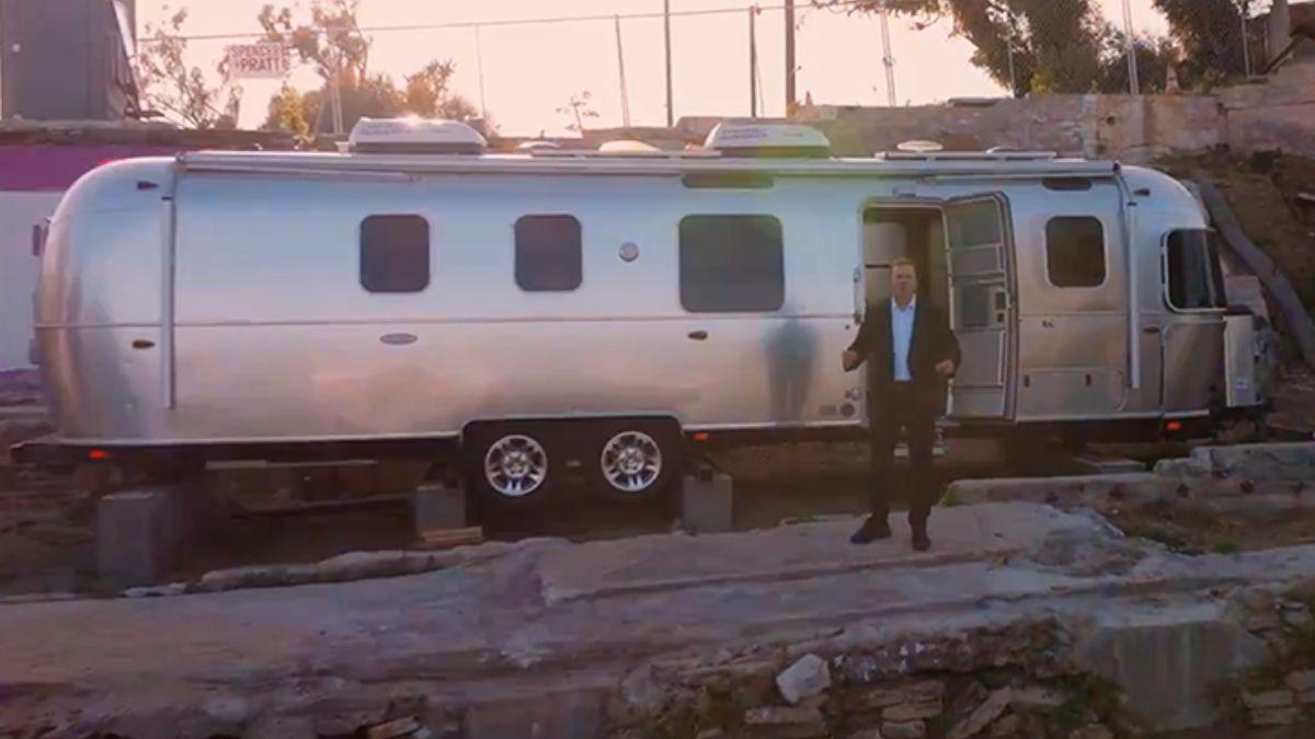 image of 'This is where I live,' the former reality star declared in the ad, as he stood in front of a trailer.