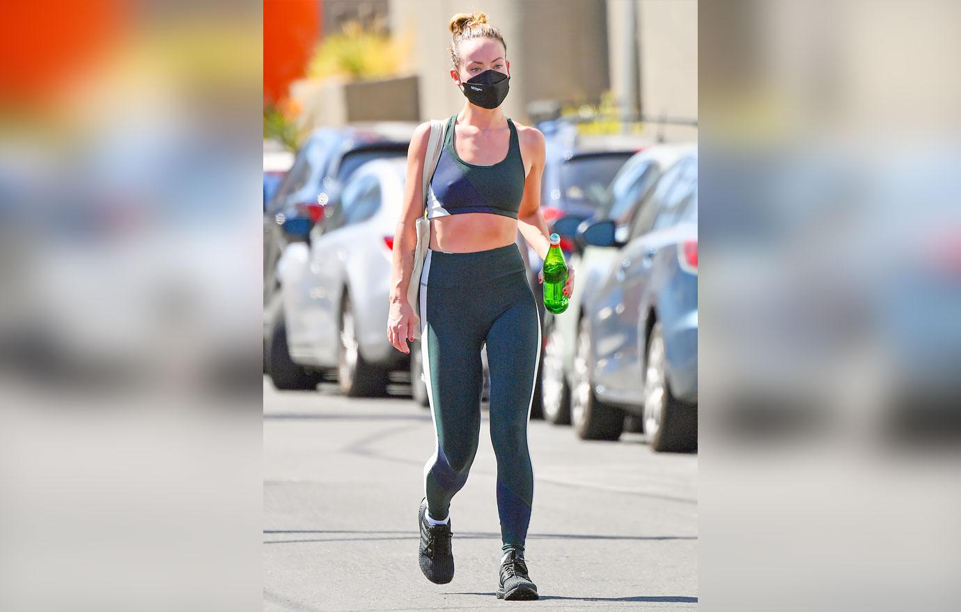 olivia wilde sports bra leggings face mask gym