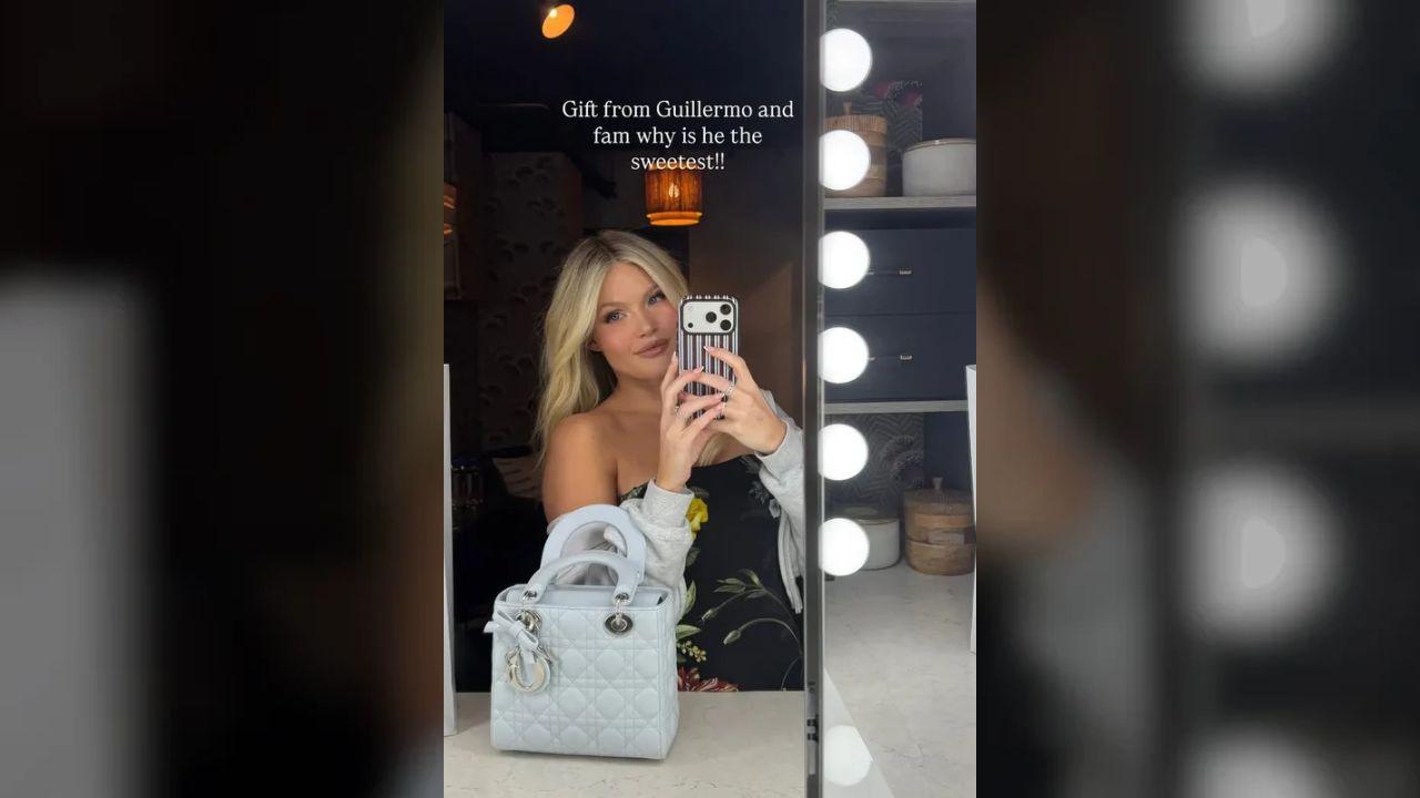 Image of Witney Carson showed off the baby blue Dior bag gifted to her by Guillermo Rodriguez and his family.