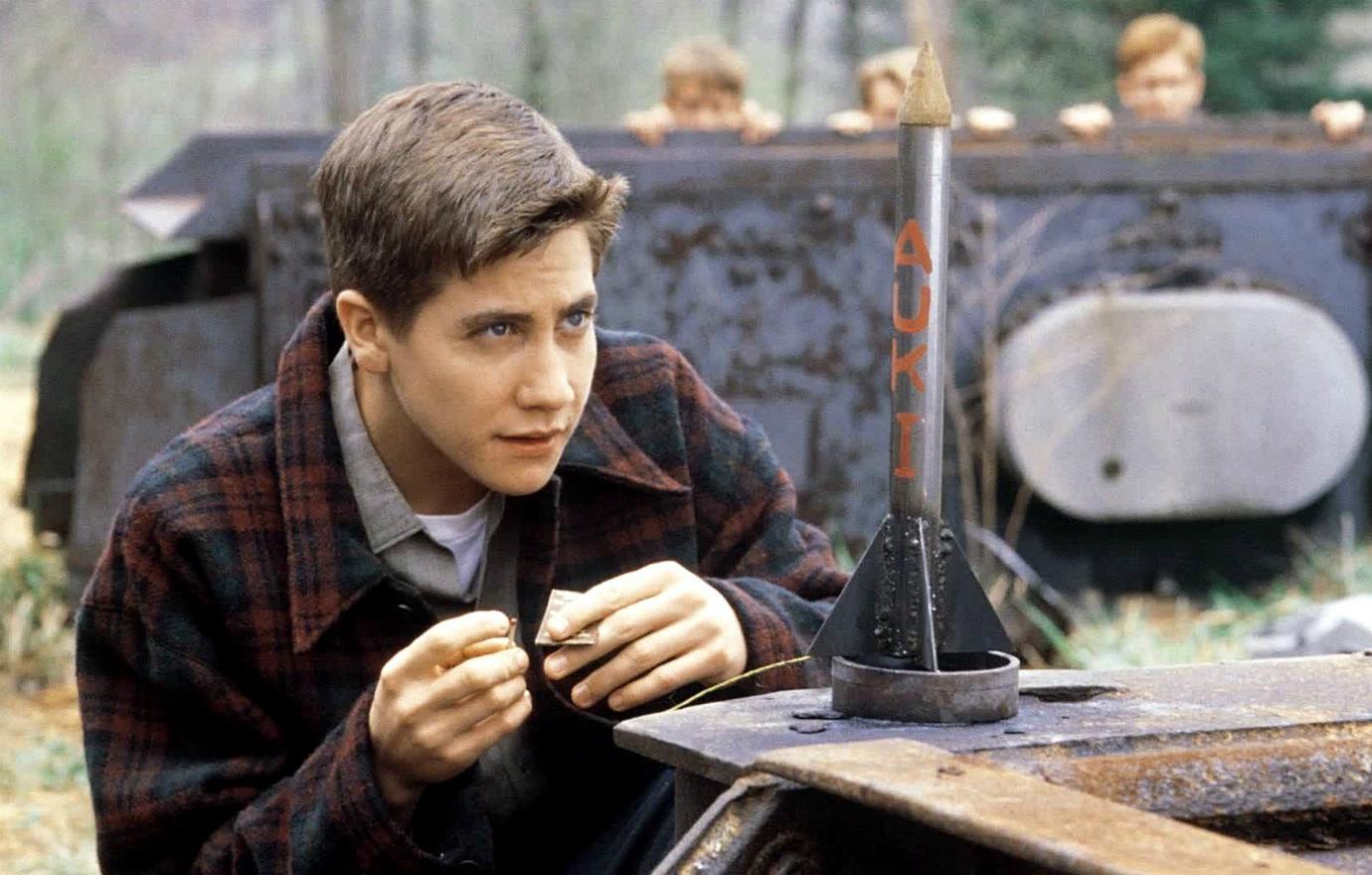 Jake Gyllenhaal wore a dark plaid shirt as he set off a rocket in October Sky.