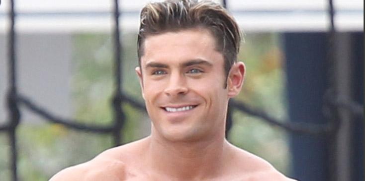 Zac Efron shirtless on the monkey bars filming Baywatch in Miami Beach