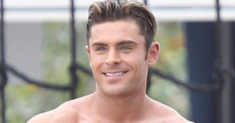 Zac Efron shirtless on the monkey bars filming Baywatch in Miami Beach