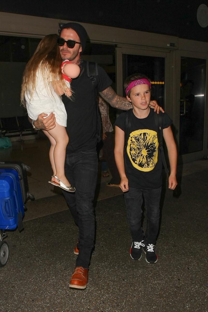 david beckham harper romeo catching flight