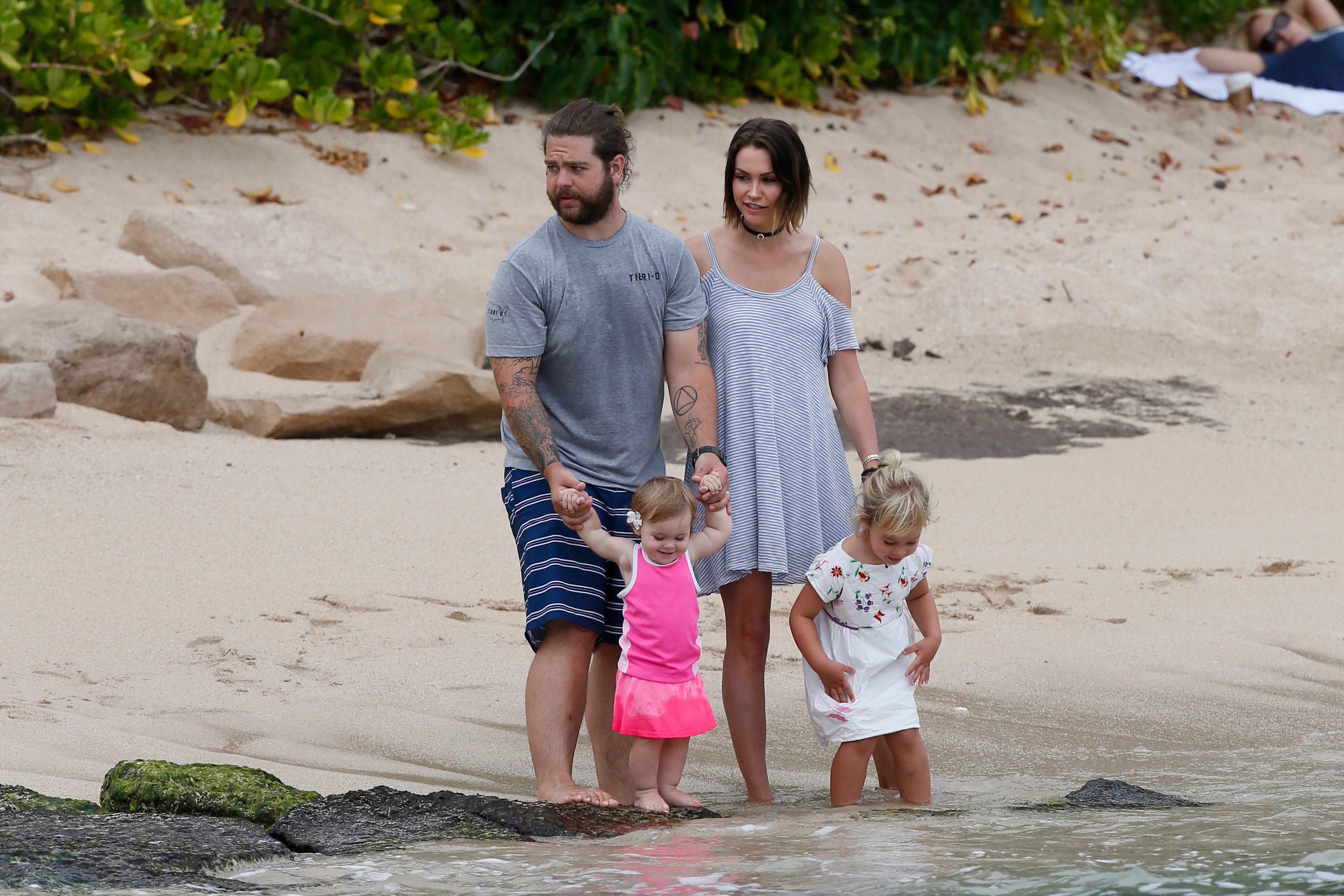 EXCLUSIVE: jack osbourne takes to the beach in Hawaii with his wife Lisa and children Pearl and Andy Rose