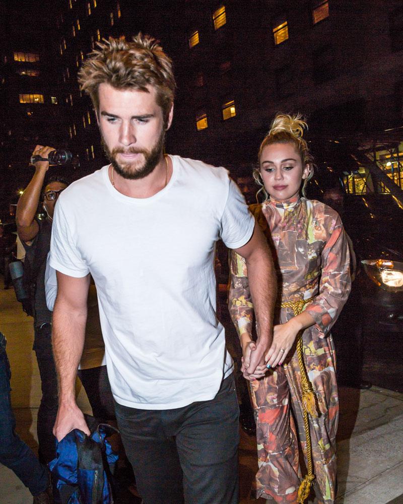 miley cyrus liam hemsworth wedding stand off 03