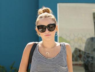 Miley cyrus july11 tattoo arm.jpg