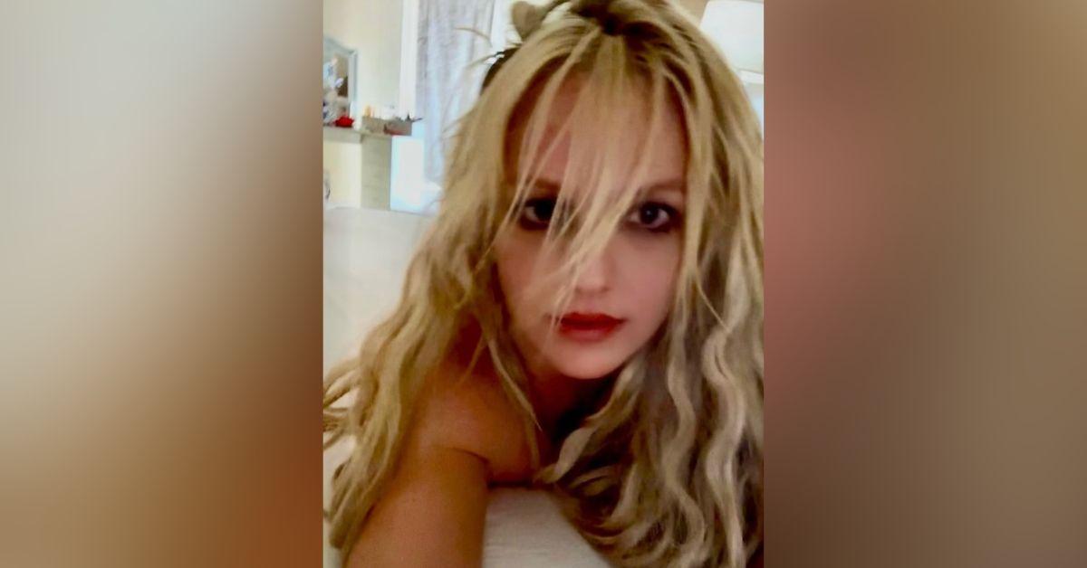 Image of Britney Spears ditched clothing altogether in bed.