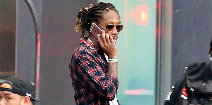 Rapper, Future talks on his iPhone &amp; wears Slippers with Socks as he leaves his hotel in Toronto after OVO Fest