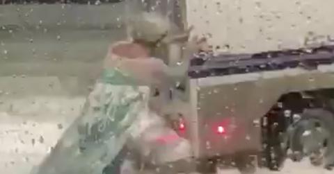 Drag elsa frees stuck police wagon blizzard boston video