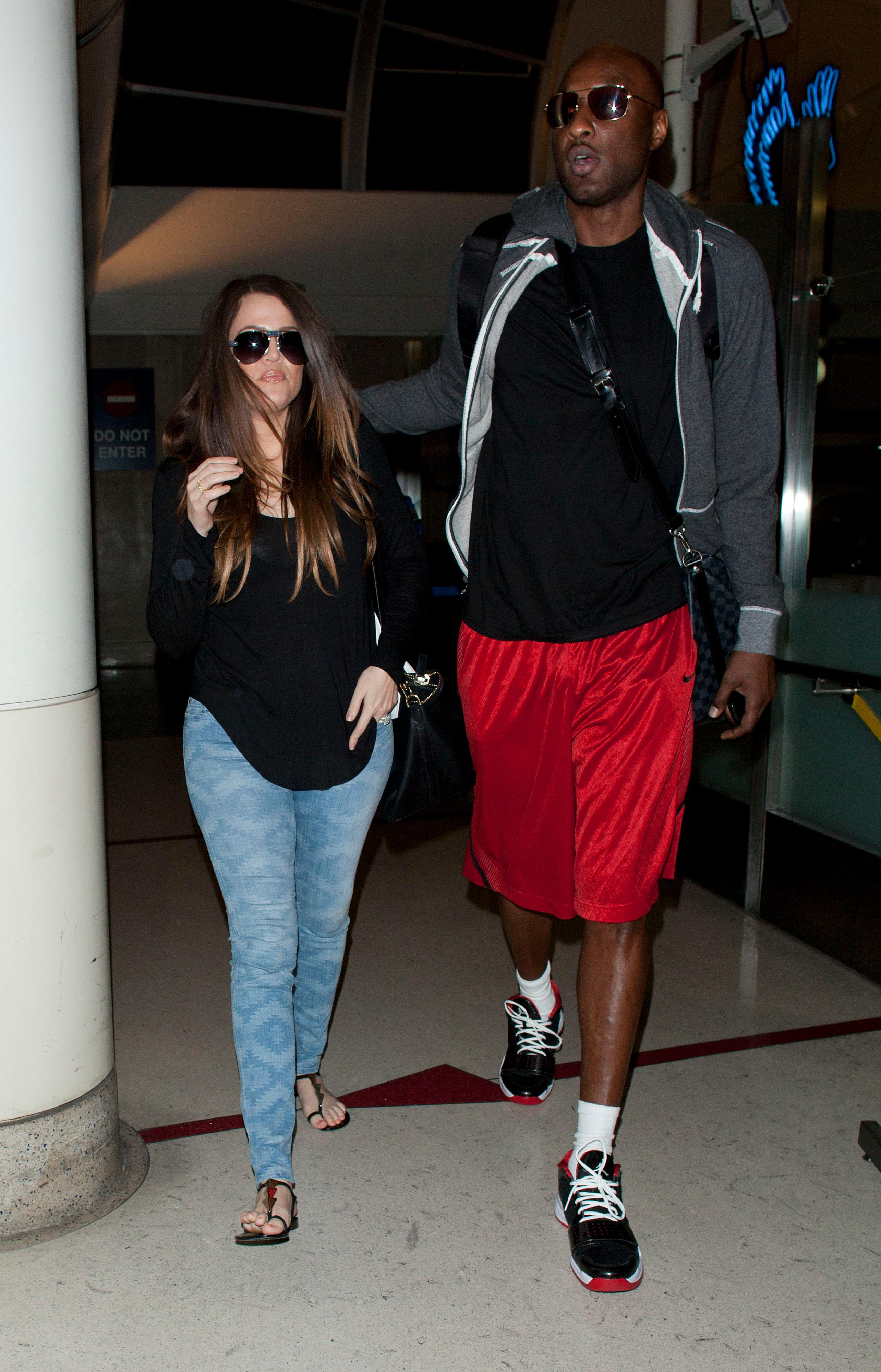 Reality stars Khloe Kardashian and her basketball player husband Lamar Odom arrive at LAX, after a short trip to Las Vegas