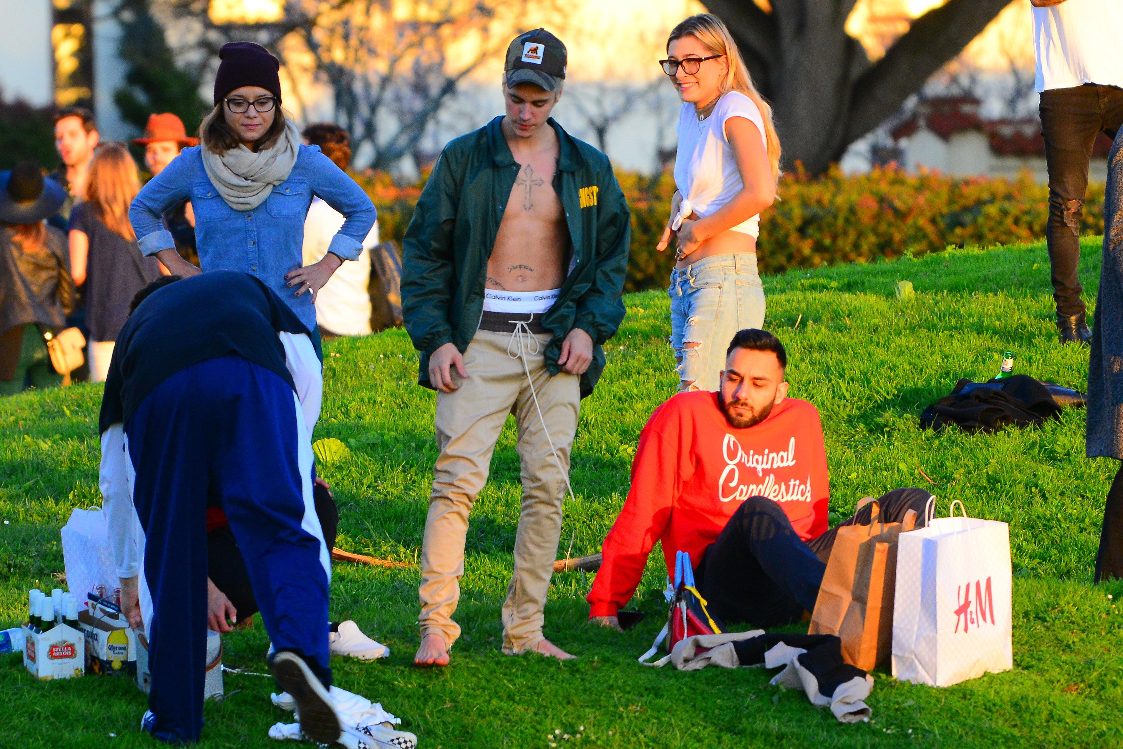 EXCLUSIVE: Justin Bieber and Hailey Baldwin drink and spotted in San Francisco park with friends