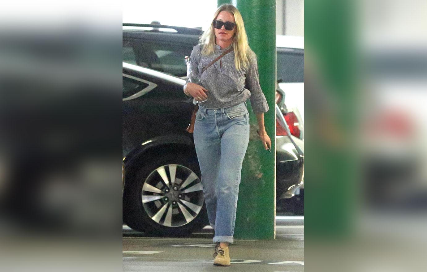 Cameron Diaz Carrying a Glass Water Bottle as she Arrives for a Meeting