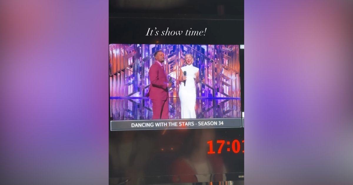 image of Alfonso Ribeiro helped Julianne Hough steady herself.