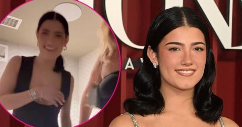 charli damelio black dress nip slip