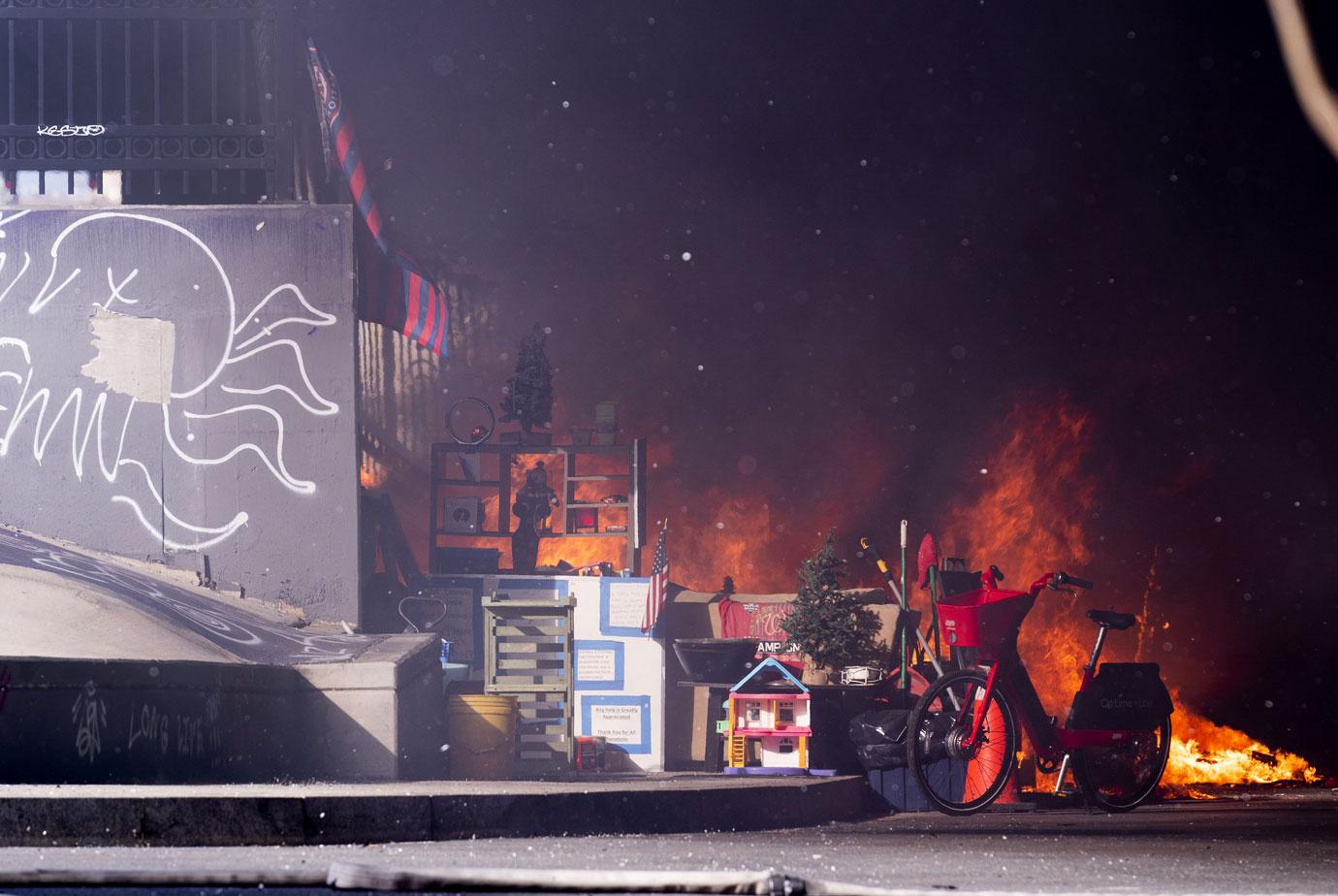 fire at a homeless encampment near the U.S. Capitol in Washington, DC on Monday, January 18, 2021. 