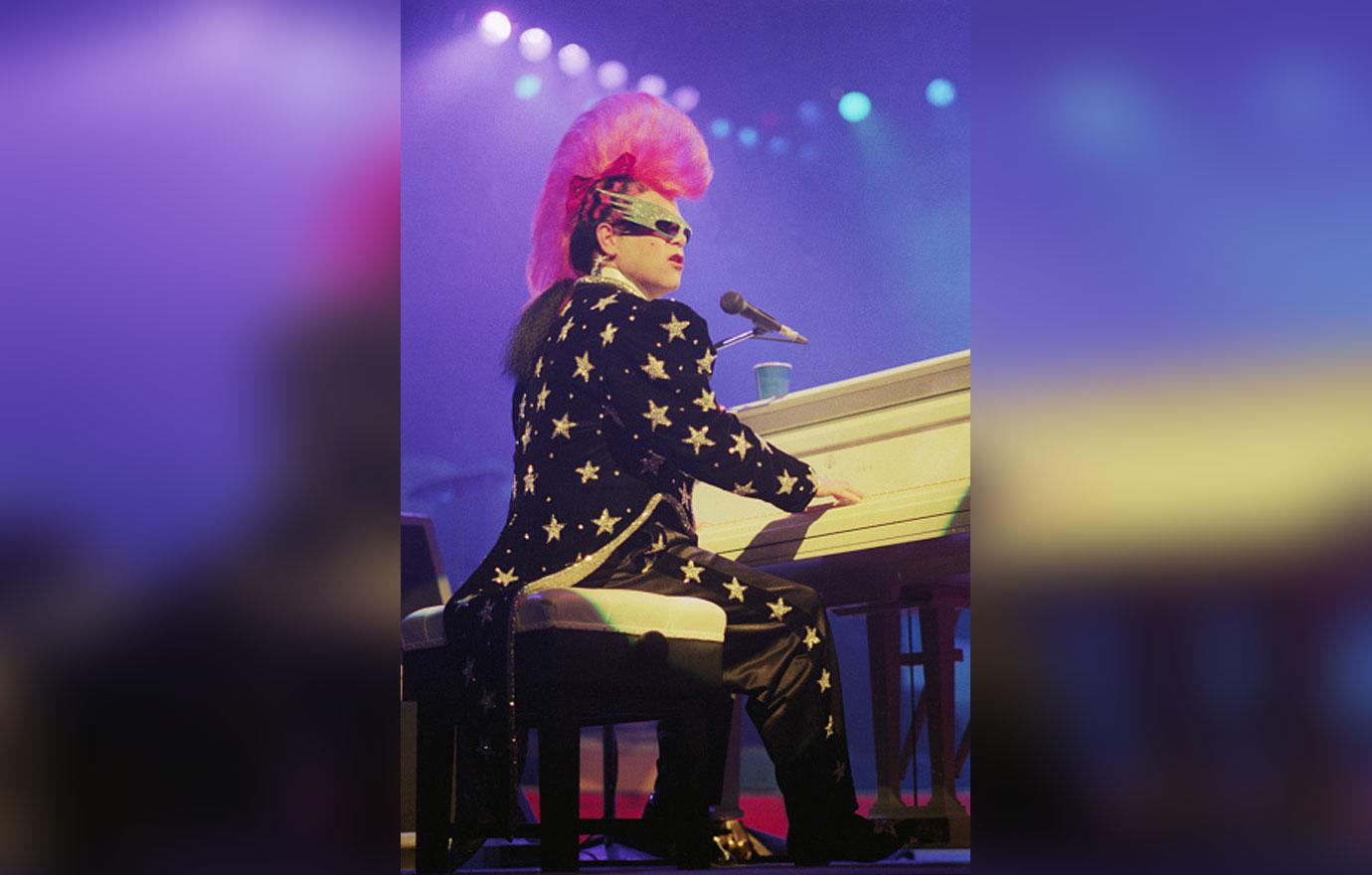 Elton John Performs with Mohawk Hairdo