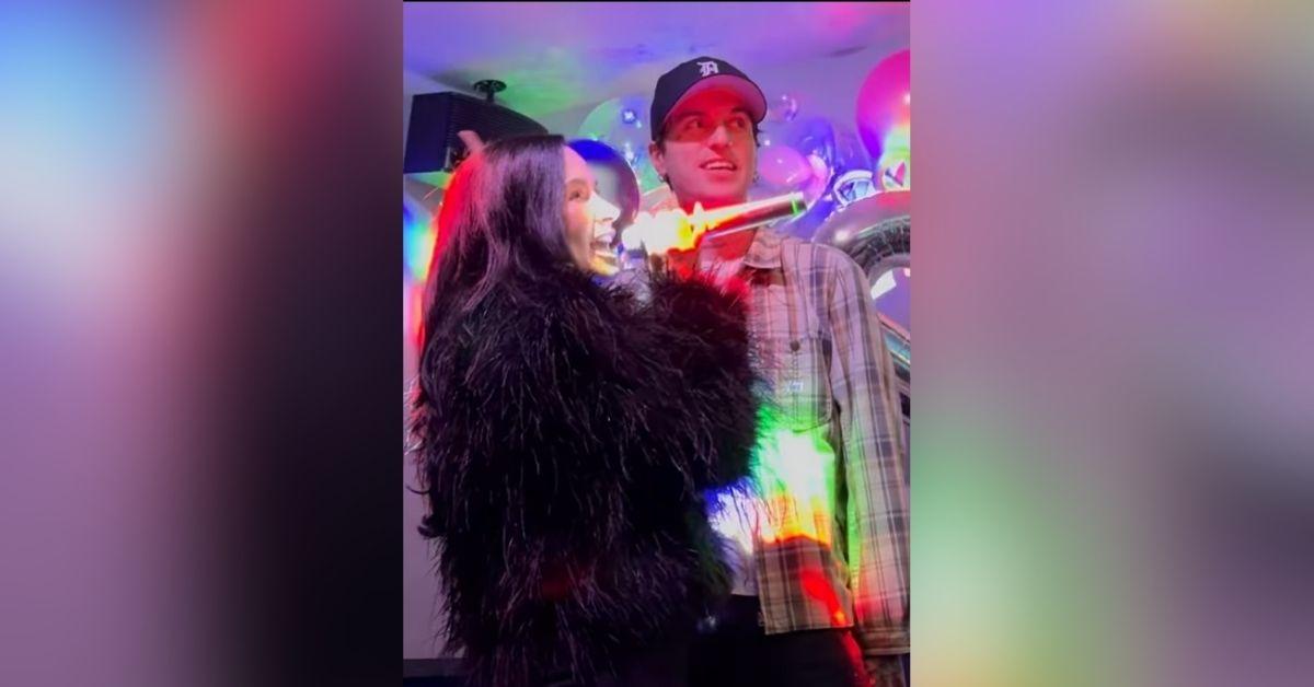 image of The 'Heart Attack' songstress' husband, Jutes, danced beside her during karaoke. 