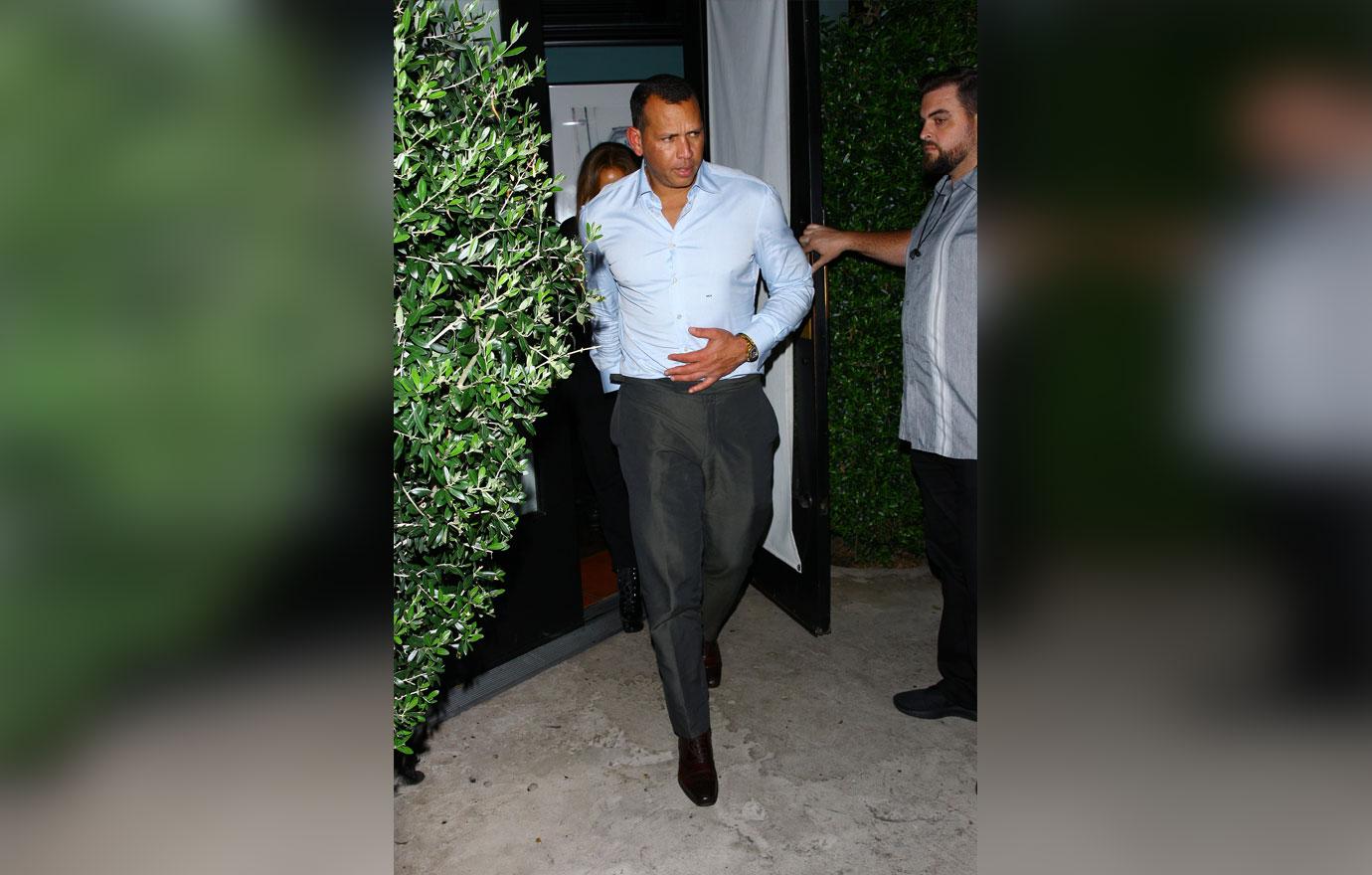 EXCLUSIVE: Jennifer Lopez holds hands with Alex Rodriguez as they leave Italian restaurant Osteria Mozza after having a romantic dinner