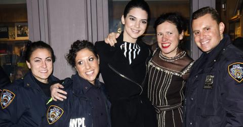 Kendall Jenner gets photo boomed by the NYPD at a book signing.