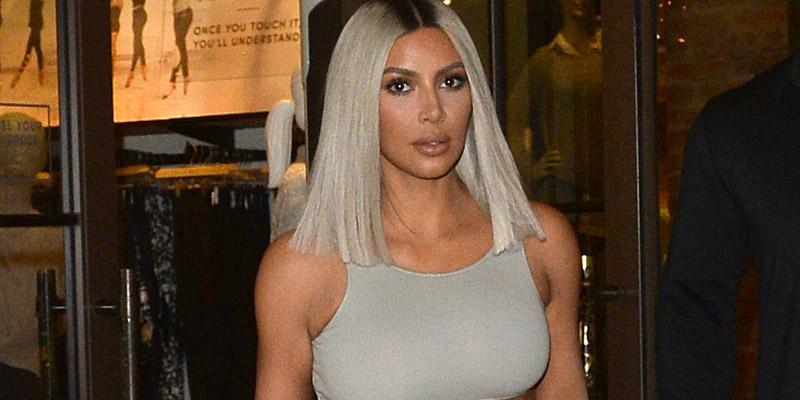 Kim Kardashian Reveals Washboard Abs In Skintight Dress