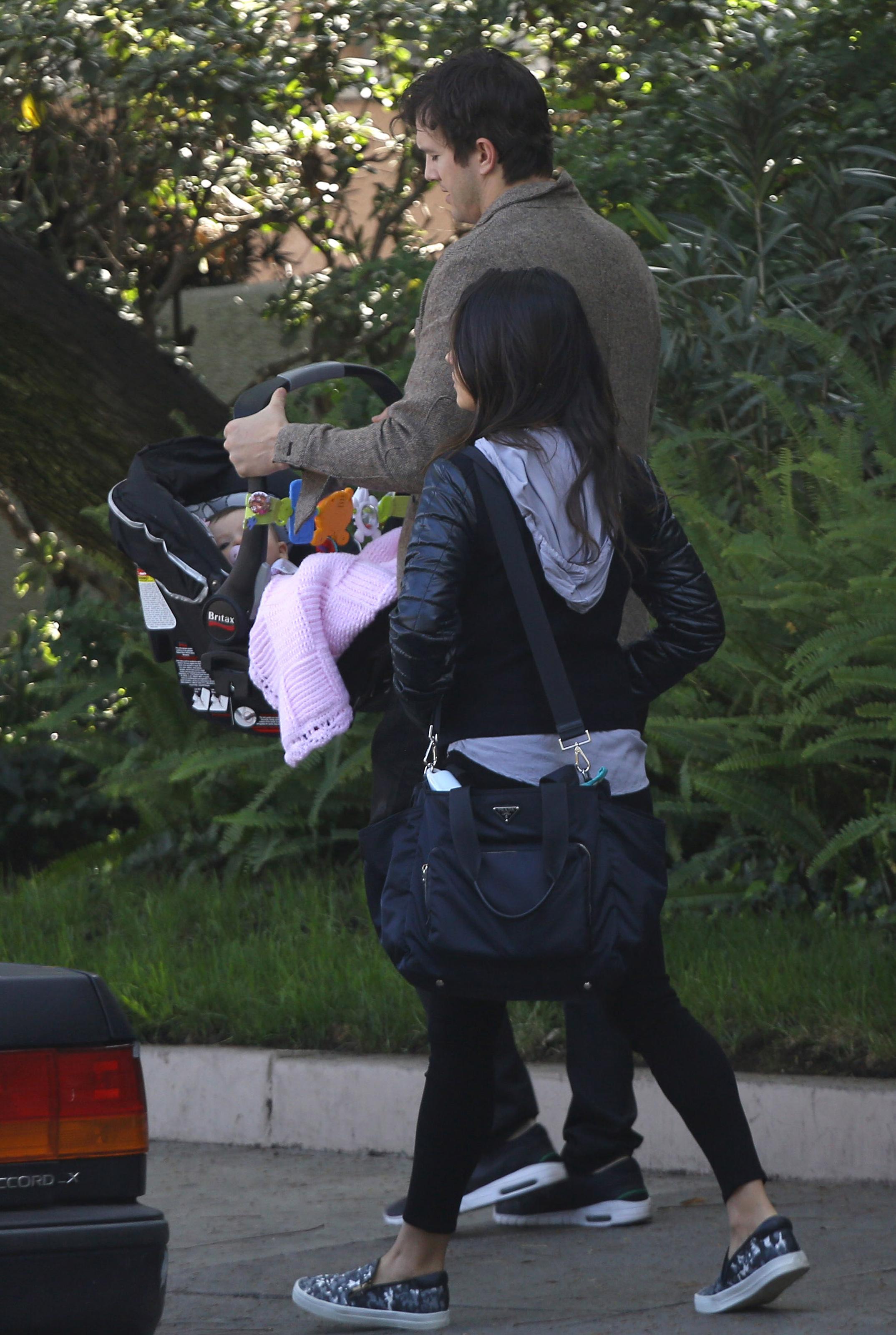 Ashton Kutcher and Mila Kunis enjoy a day out with baby girl Wyatt and parents