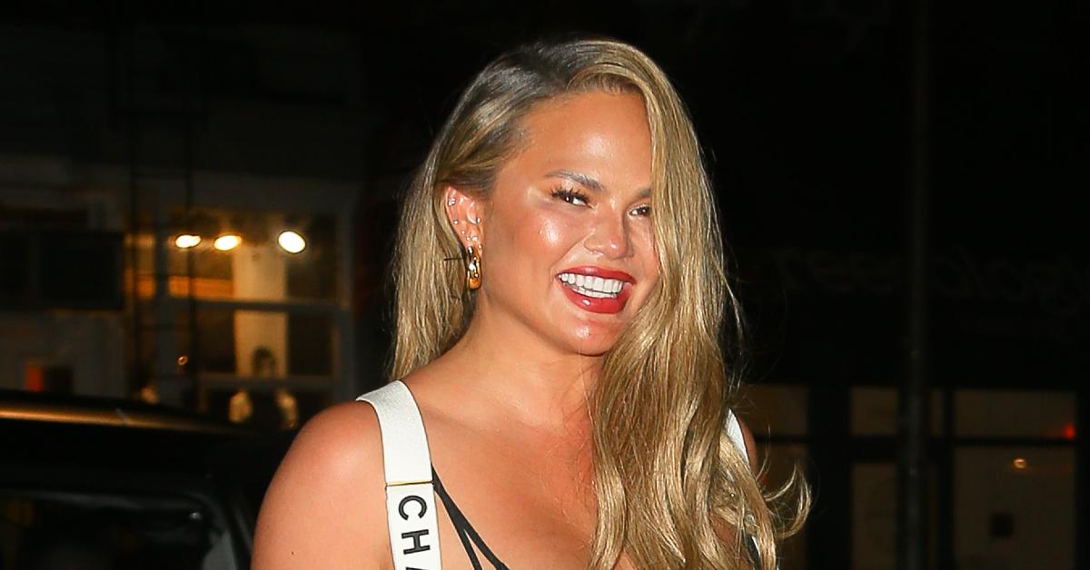 Chrissy Teigen poses in see-through tights in bed with hubby John Legend in  saucy Instagram snap