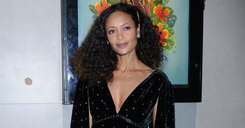 Thandie newton deep cut black gown cinched waist main