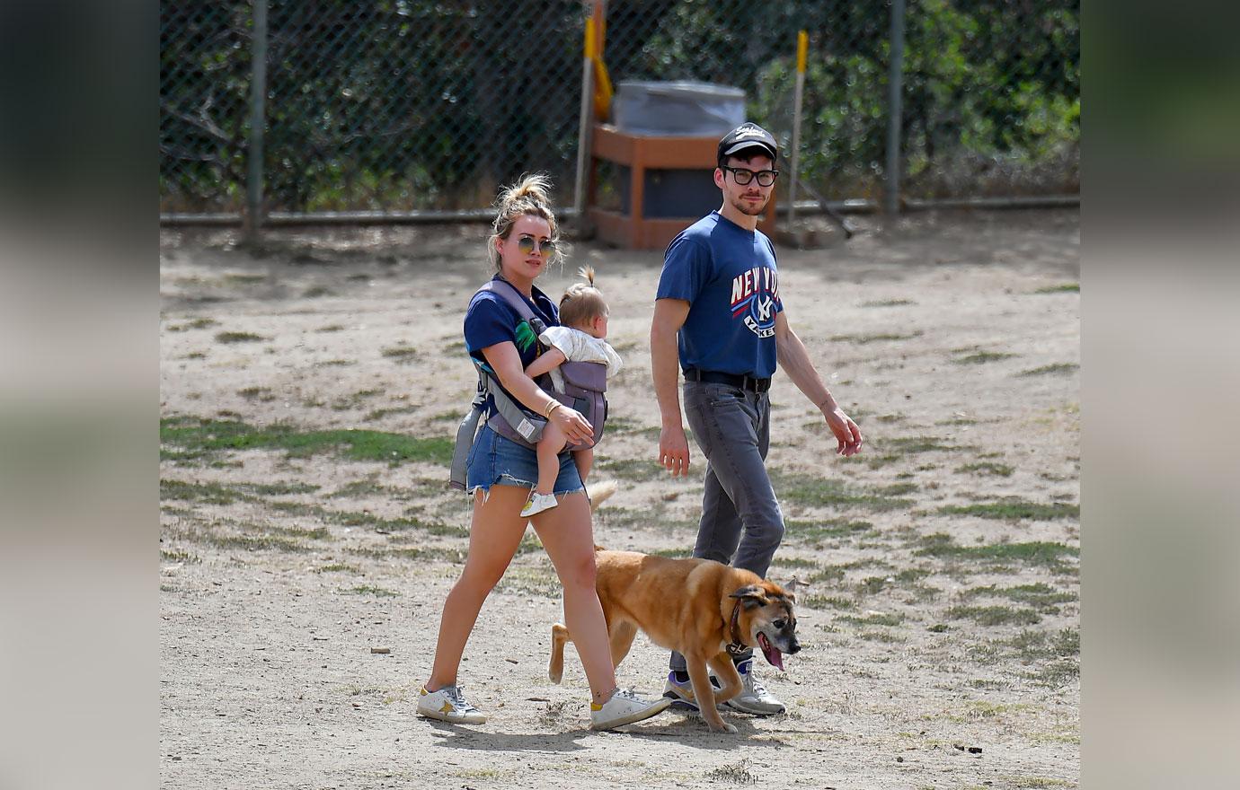 Hilary Duff and her Fiance Matthew Koma take their daughter and dogs to a dog park in Los Angeles