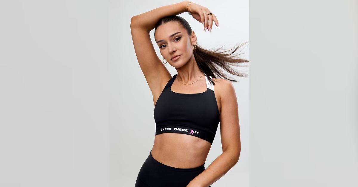 Image of Kristin Juszczyk partnered with Athleta to create a sports bra for Breast Cancer Awareness Month.