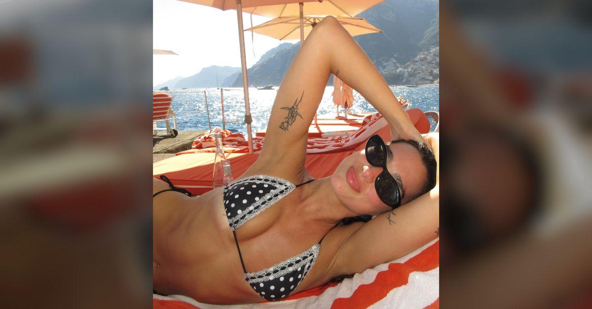 dua lipa spills out tiny polka dot bikini italy callum turner photos