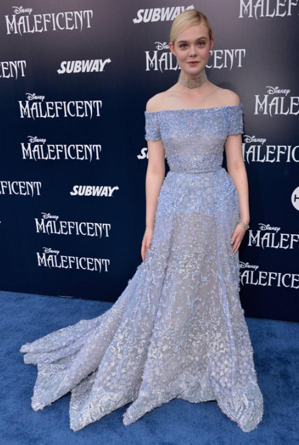 Elle Fanning Takes Paris in an Electric Silver Slipdress Covered in Sequins