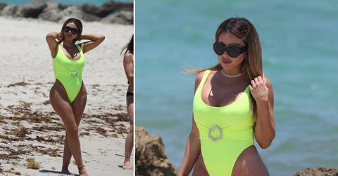 larsa pippen in neon yellow swimsuit in miami