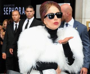 Lady Gaga in a Louis Vuitton Wheel chair recovering from a hip