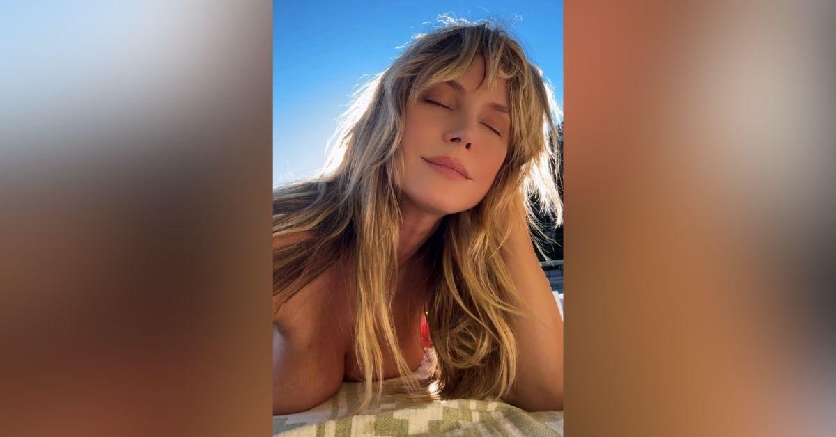 image of Heidi Klum shared a topless sunbathing video on Instagram.