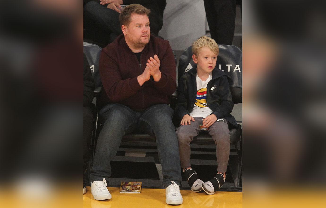 Talk Show host and Comedian James Corden and his son Max hang out at the Lakers Game